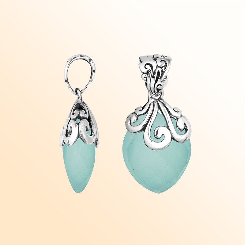 Elegant Sterling Silver Green Chalcedony Quartz marquise pendant handcrafted with swirl filigree detailing, mirror-polished surface, and soft green radiance for women’s artistic silver jewelry collections.