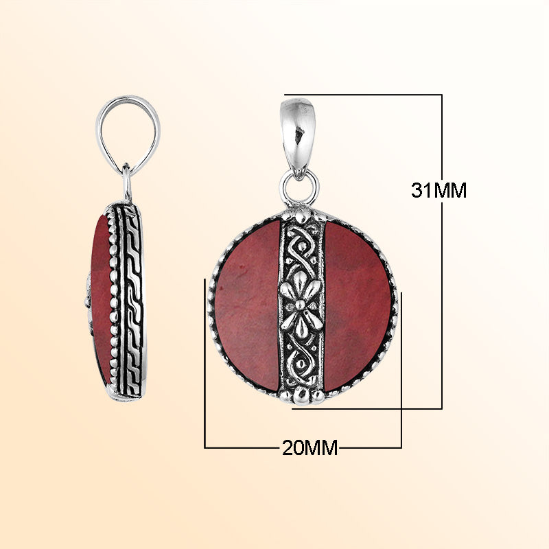 Elegant Sterling Silver Red Coral round pendant featuring handcrafted floral center pattern, mirror-polished finish, and bold red tone for women’s artistic jewelry collections.