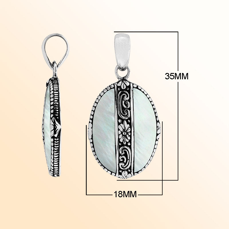 Elegant Sterling Silver Mother Of Pearl oval pendant with floral center detailing, handcrafted mirror-polished finish, and luminous white tone for women’s artistic jewelry collections.
