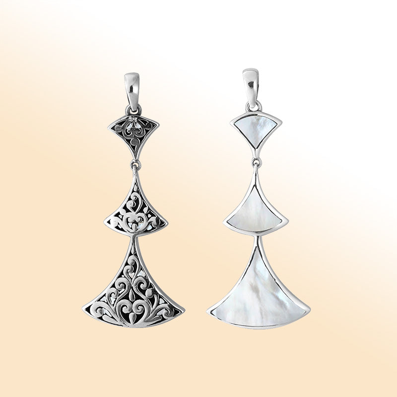 Sterling silver Mother Of Pearl pendant with graceful Balinese detailing and elegant luminous artisan charm.