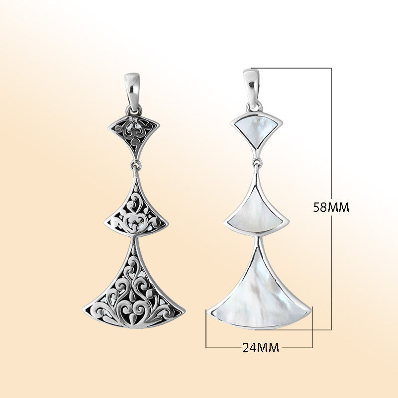 Sterling silver Mother Of Pearl pendant with graceful Balinese detailing and elegant luminous artisan charm.