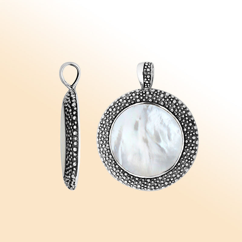 Elegant Sterling Silver Mother Of Pearl Round Pendant With Artistic Balinese Granulated Frame And Polished Silver Finish