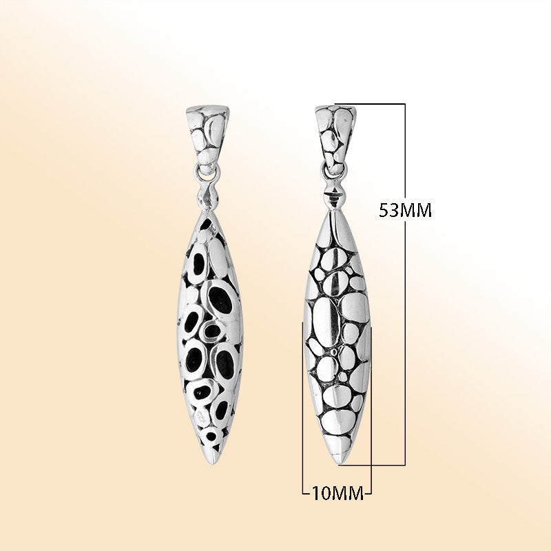 Artistic sterling silver long teardrop pendant with raised pebble texture handcrafted in Balinese design