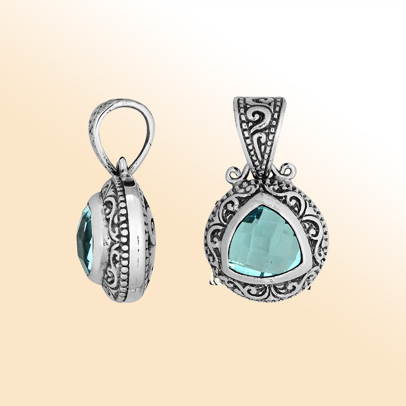 Elegant sterling silver triangular pendant with Blue Topaz Quartz and Balinese handcrafted detailing
