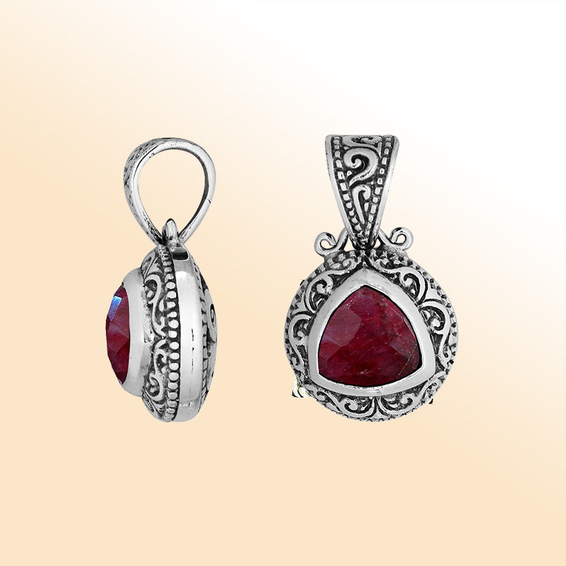 Elegant sterling silver triangular pendant with Ruby Quartz and Balinese handcrafted detailing