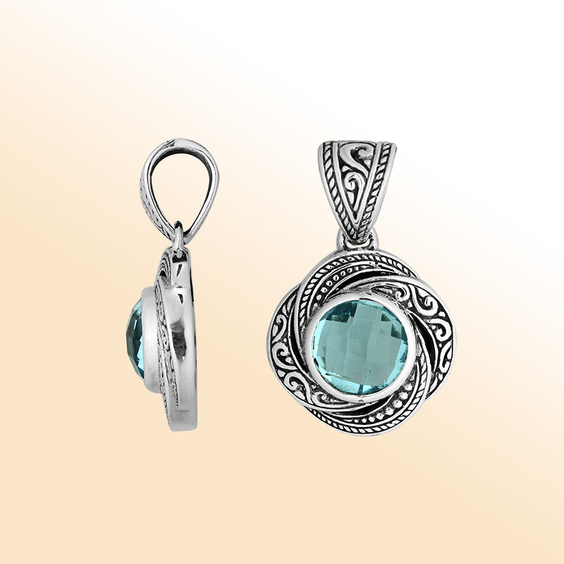 Elegant sterling silver round pendant with Blue Topaz Quartz and Balinese handcrafted detailing
