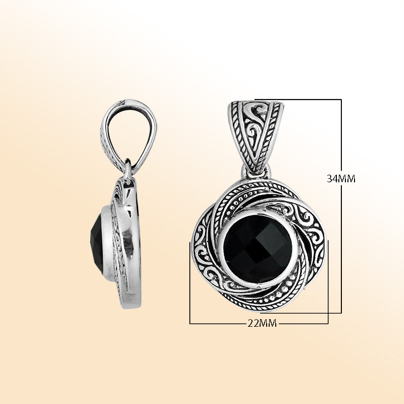 A beautifully handcrafted sterling silver pendant featuring a polished Black Onyx embraced by swirling filigree, reflecting artistic Balinese craftsmanship and elegant feminine charm.
