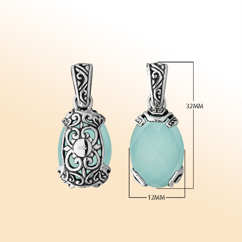 An elegant sterling silver pendant featuring a soothing Green Chalcedony Quartz set within a detailed Balinese filigree frame, handcrafted with artistic precision.