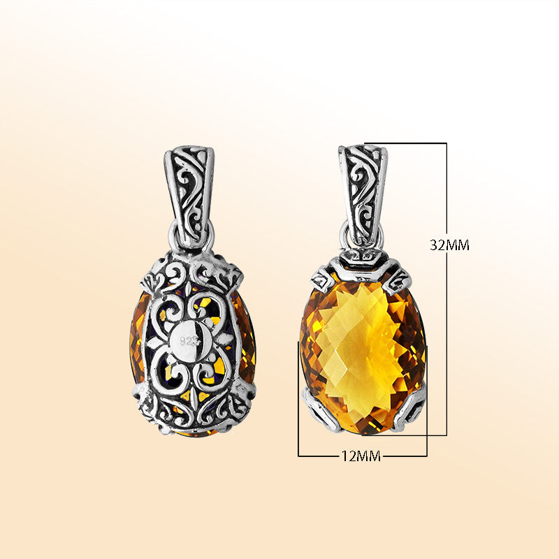 An elegant sterling silver pendant featuring a sparkling Citrine Quartz set in detailed Balinese filigree, radiating handcrafted artistry and golden elegance.