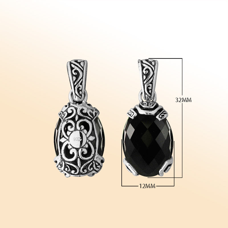 An elegant sterling silver pendant featuring a luminous Black Onyx stone set in intricate Balinese filigree, handcrafted with timeless artistry and refined elegance.