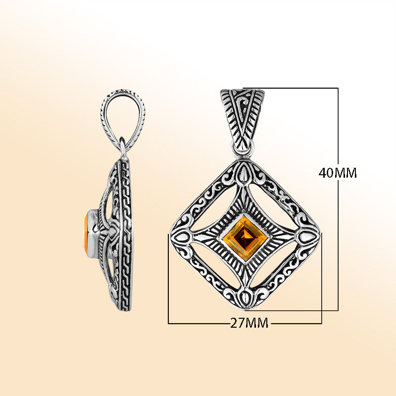 An elegant sterling silver pendant featuring a glowing Citrine Quartz in a handcrafted Balinese filigree frame, radiating artistry and timeless elegance.