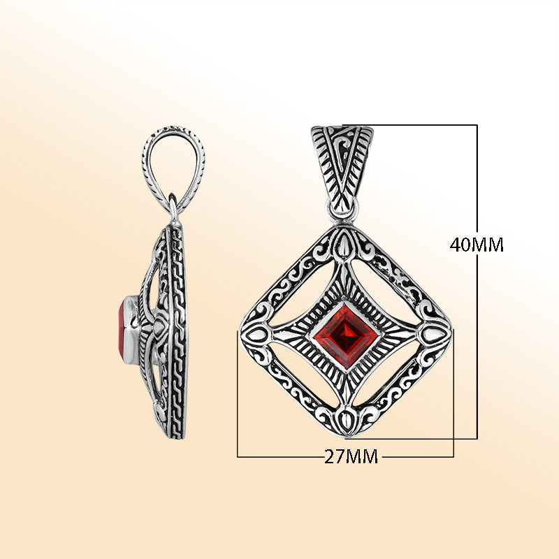 An elegant sterling silver pendant featuring a deep Red Garnet Quartz in a detailed Balinese filigree frame, handcrafted with intricate artistry and shine.