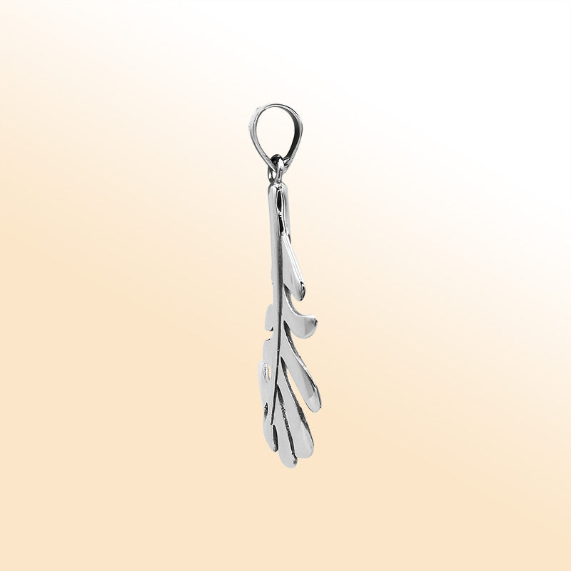 An elegant sterling silver feather pendant handcrafted with curved leaf-inspired detailing and a bright mirror-polished Balinese finish.
