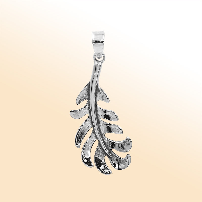 An elegant sterling silver feather pendant handcrafted with curved leaf-inspired detailing and a bright mirror-polished Balinese finish.
