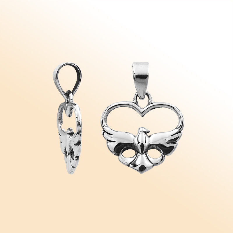 An elegant sterling silver heart and dove pendant handcrafted with Balinese artistry and a smooth, polished finish symbolizing peace and love.