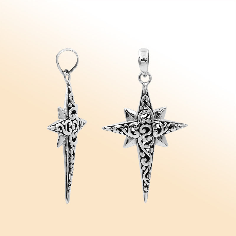 An elegant sterling silver compass star pendant handcrafted with Balinese filigree and a mirror-polished artistic finish symbolizing guidance and strength.