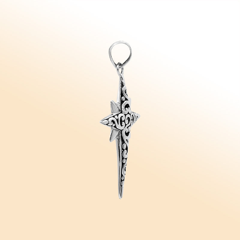 An elegant sterling silver compass star pendant handcrafted with Balinese filigree and a mirror-polished artistic finish symbolizing guidance and strength.