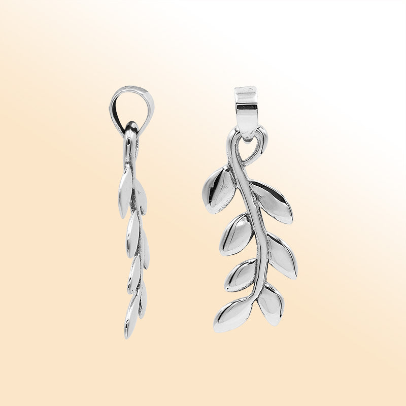 An elegant sterling silver leaf vine pendant handcrafted with polished detailing and organic Balinese artistry for timeless style.