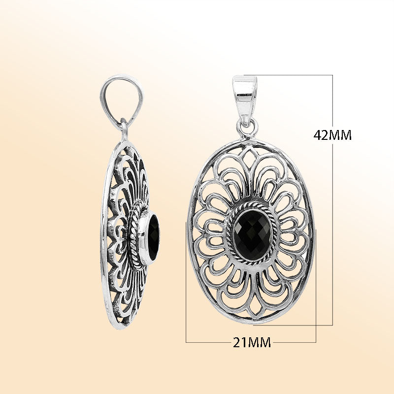 An elegant sterling silver oval pendant featuring a Black Onyx with detailed Balinese filigree and polished craftsmanship.