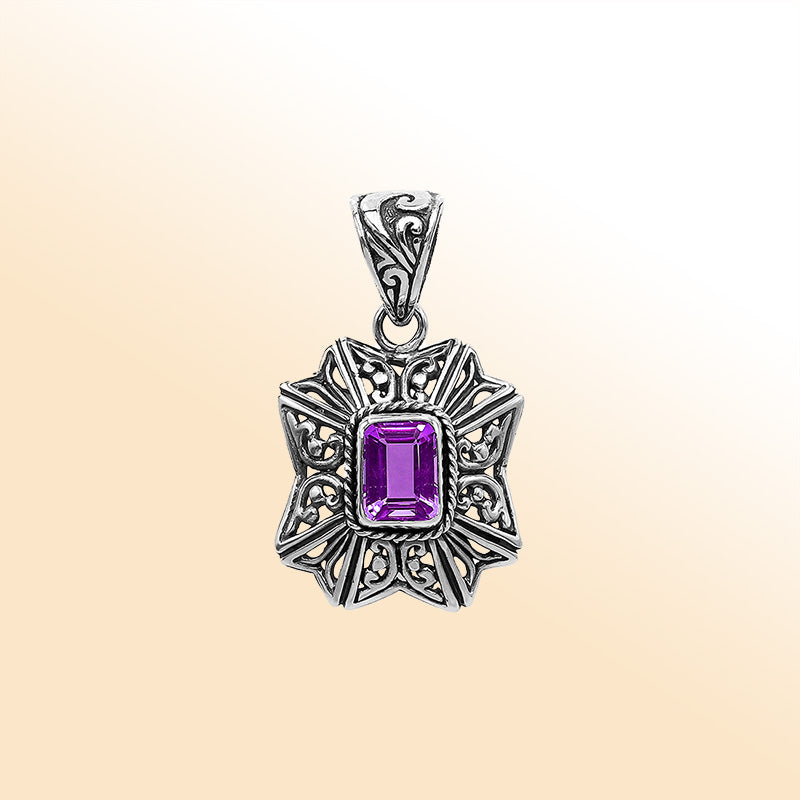 Elegant sterling silver pendant featuring Amethyst Quartz stone with intricate handcrafted Balinese motif and polished finish.