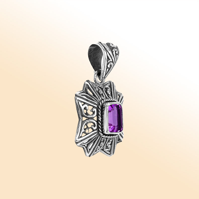 Elegant sterling silver pendant featuring Amethyst Quartz stone with intricate handcrafted Balinese motif and polished finish.