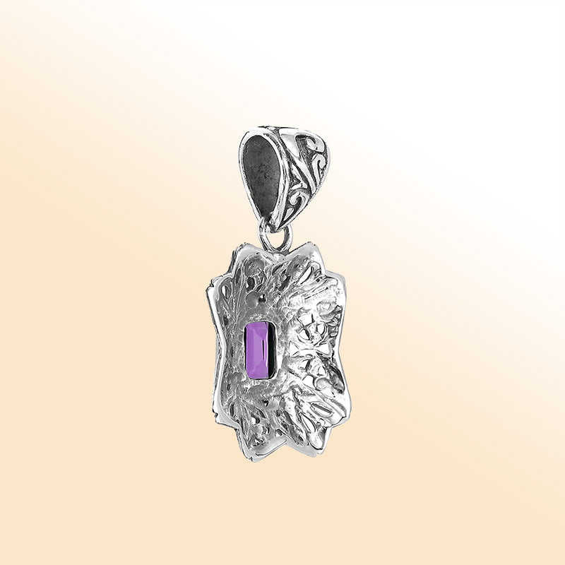 Elegant sterling silver pendant featuring Amethyst Quartz stone with intricate handcrafted Balinese motif and polished finish.