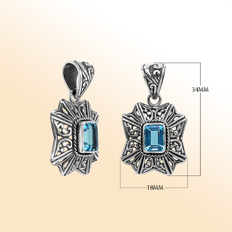 Elegant sterling silver Blue Topaz Quartz pendant with artistic Balinese handcrafted filigree design.