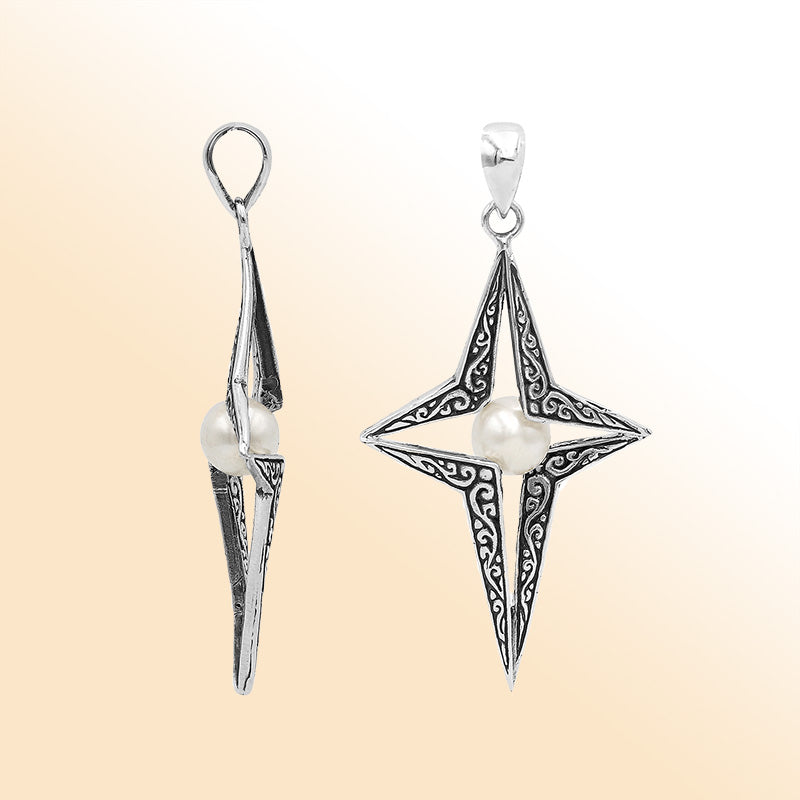 Elegant sterling silver radiant star pendant featuring White Pearl centerpiece with artistic filigree detailing and polished finish.