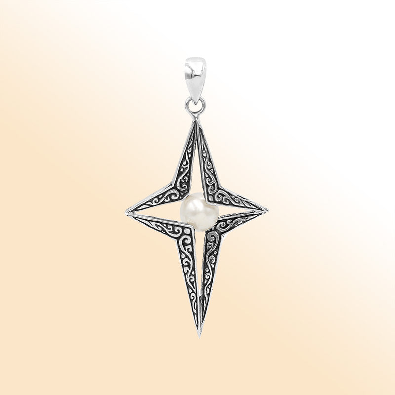 Elegant sterling silver radiant star pendant featuring White Pearl centerpiece with artistic filigree detailing and polished finish.