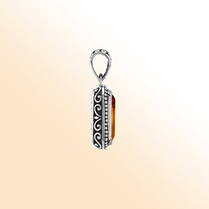 Elegant sterling silver rectangular pendant featuring Citrine Quartz center with artistic beaded border and polished finish.
