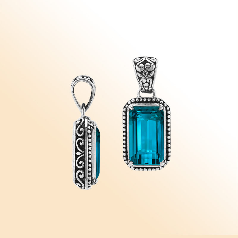Elegant sterling silver rectangular pendant with London Blue Topaz Quartz center and artistic beaded border craftsmanship.