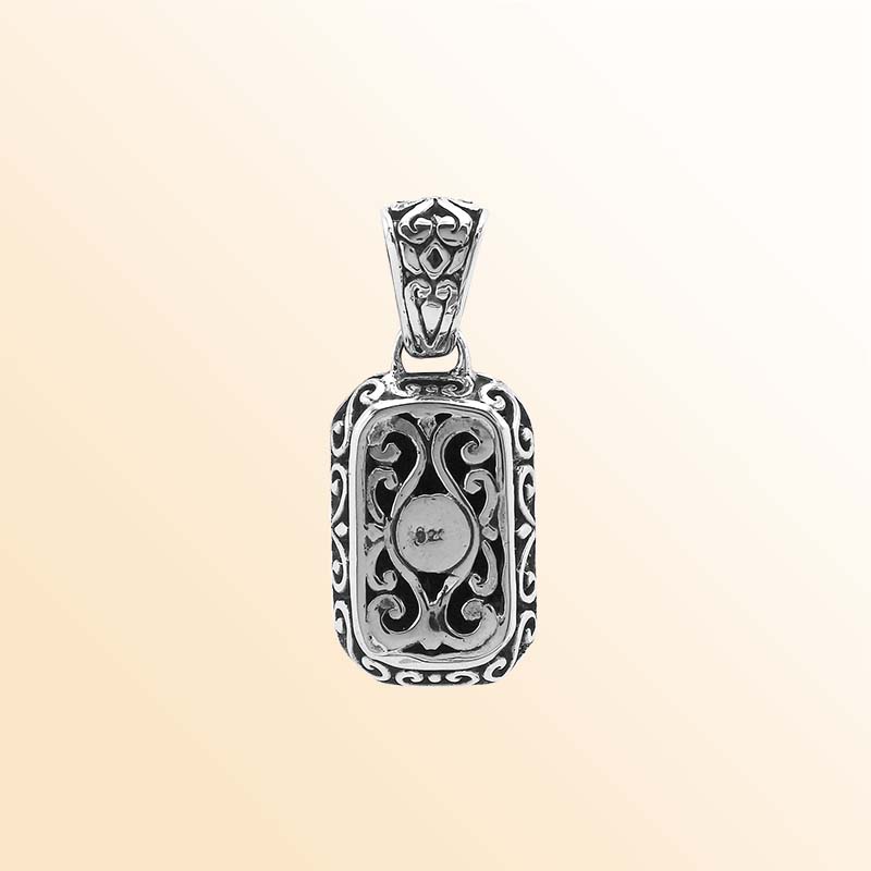 Elegant sterling silver rectangular pendant with London Blue Topaz Quartz center and artistic beaded border craftsmanship.