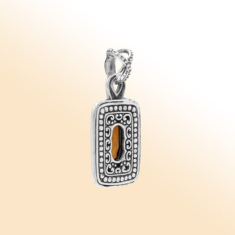 Elegant sterling silver oval pendant featuring Citrine Quartz center with artistic beaded frame and polished finish.