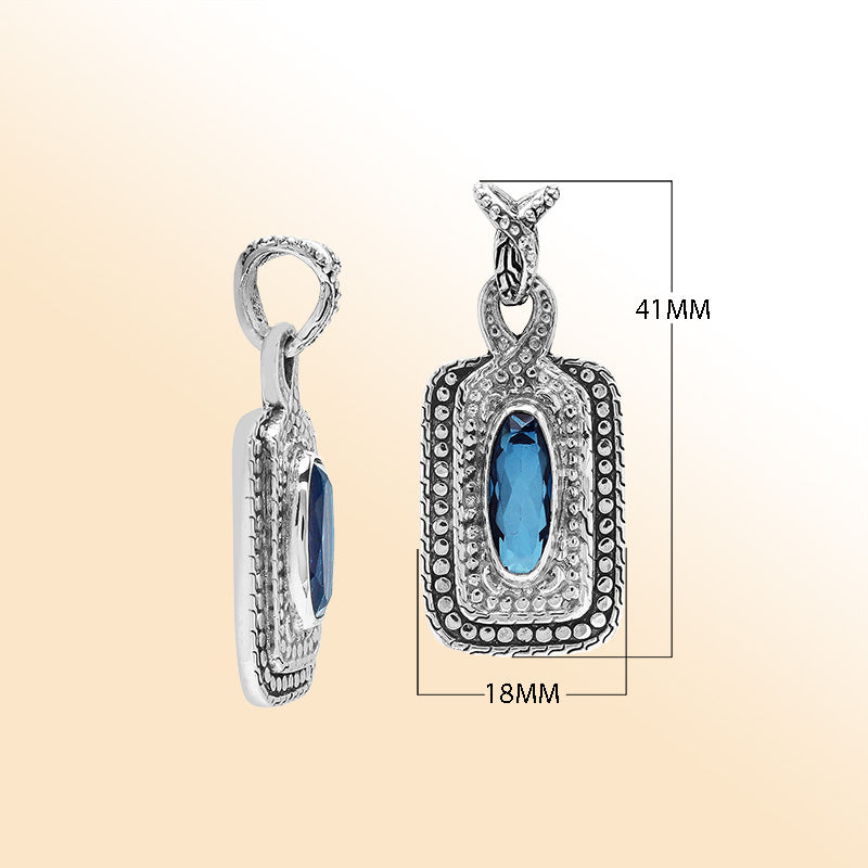 Elegant sterling silver oval pendant featuring London Blue Topaz Quartz center with artistic beaded frame and polished finish.