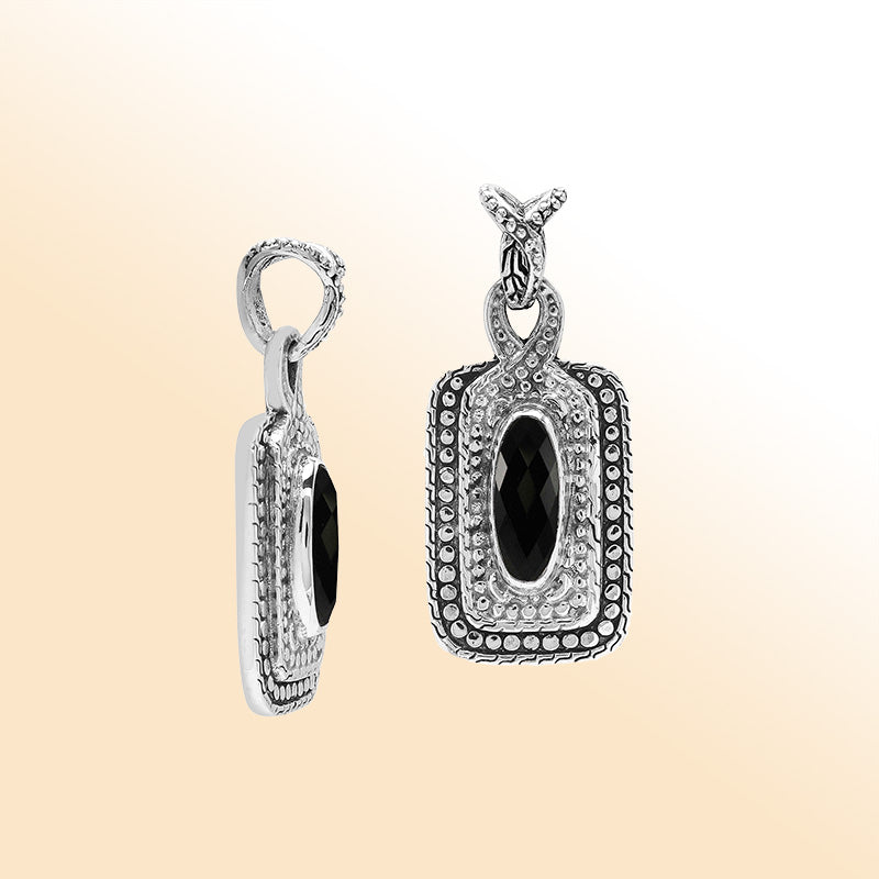 Elegant sterling silver oval pendant featuring Black Onyx center with artistic beaded frame and polished silver finish.