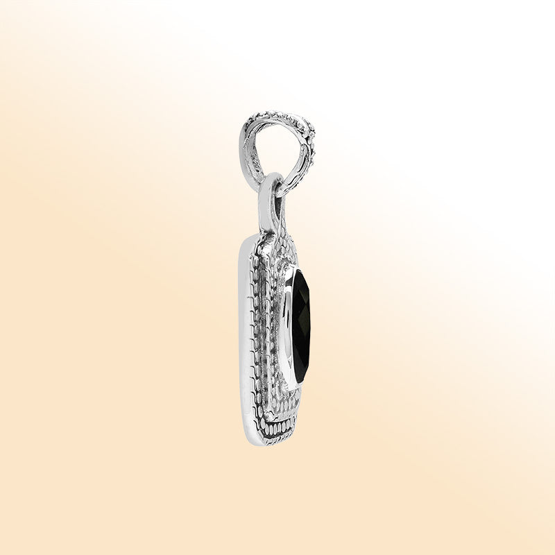 Elegant sterling silver oval pendant featuring Black Onyx center with artistic beaded frame and polished silver finish.