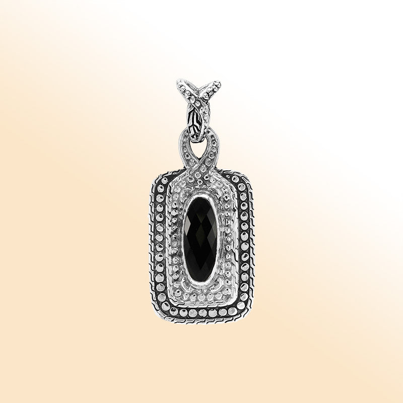 Elegant sterling silver oval pendant featuring Black Onyx center with artistic beaded frame and polished silver finish.