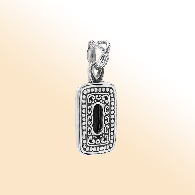 Elegant sterling silver oval pendant featuring Black Onyx center with artistic beaded frame and polished silver finish.