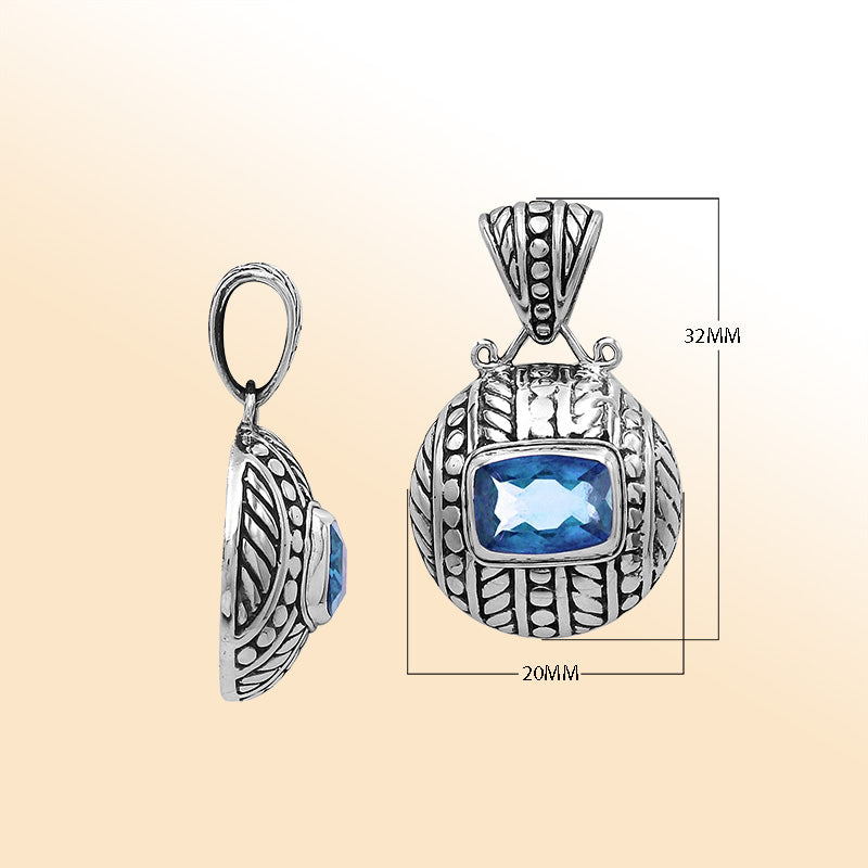 Elegant sterling silver handcrafted pendant featuring Blue Topaz Quartz in Balinese tribal design with oxidized polished finish.