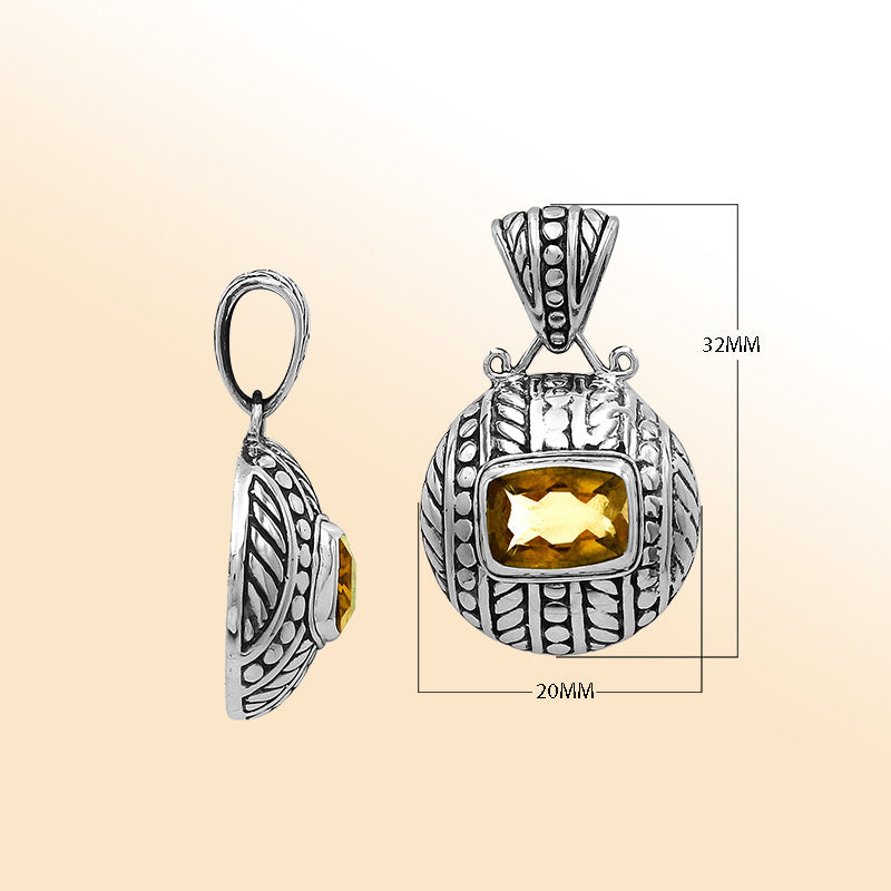 Elegant sterling silver pendant with cushion citrine quartz centerpiece, artistic leaf engravings, and smooth polished finish crafted in Balinese design tradition.