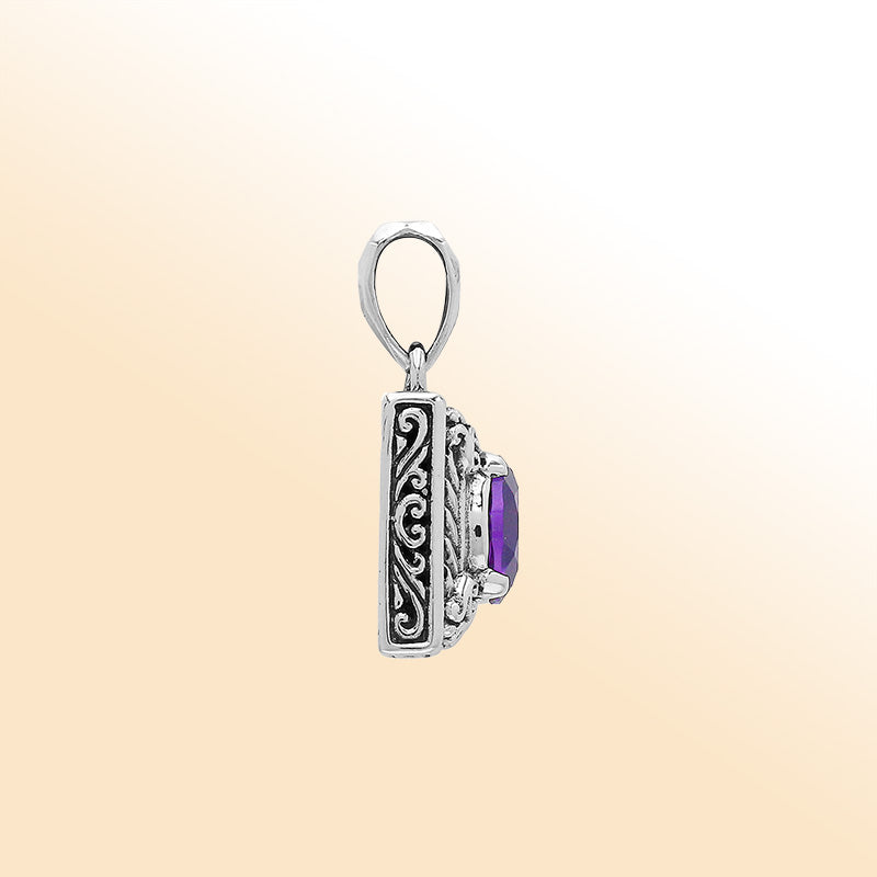 Elegant sterling silver pendant featuring an oval amethyst quartz in a rectangular frame with swirl engravings and polished high-gloss Balinese finish.