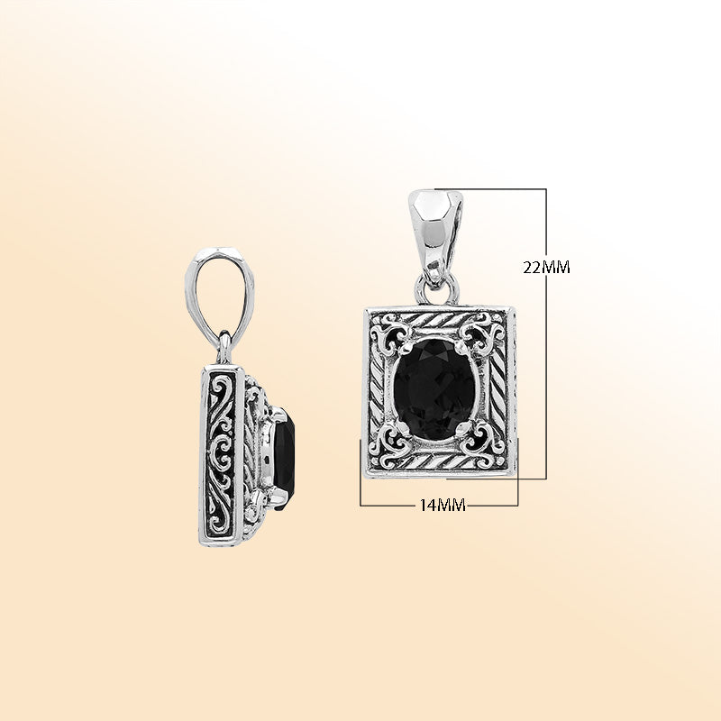 Handcrafted sterling silver pendant featuring oval black onyx quartz, ornate swirl engravings, and smooth polished finish showcasing modern Balinese artistry.