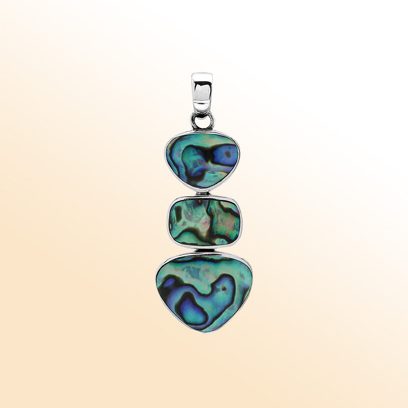 Handcrafted sterling silver triple-shape pendant with abalone shell, smooth polished surface, and ocean-inspired Balinese craftsmanship.