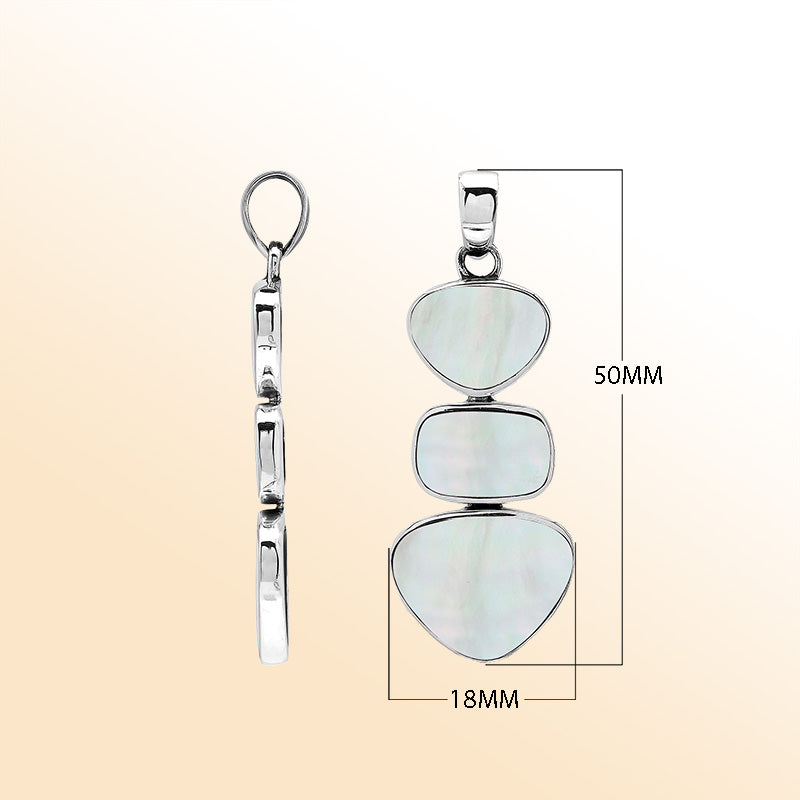 Handcrafted sterling silver triple-shape pendant with Mother Of Pearl stones, smooth polished surface, and refined Balinese artistry.