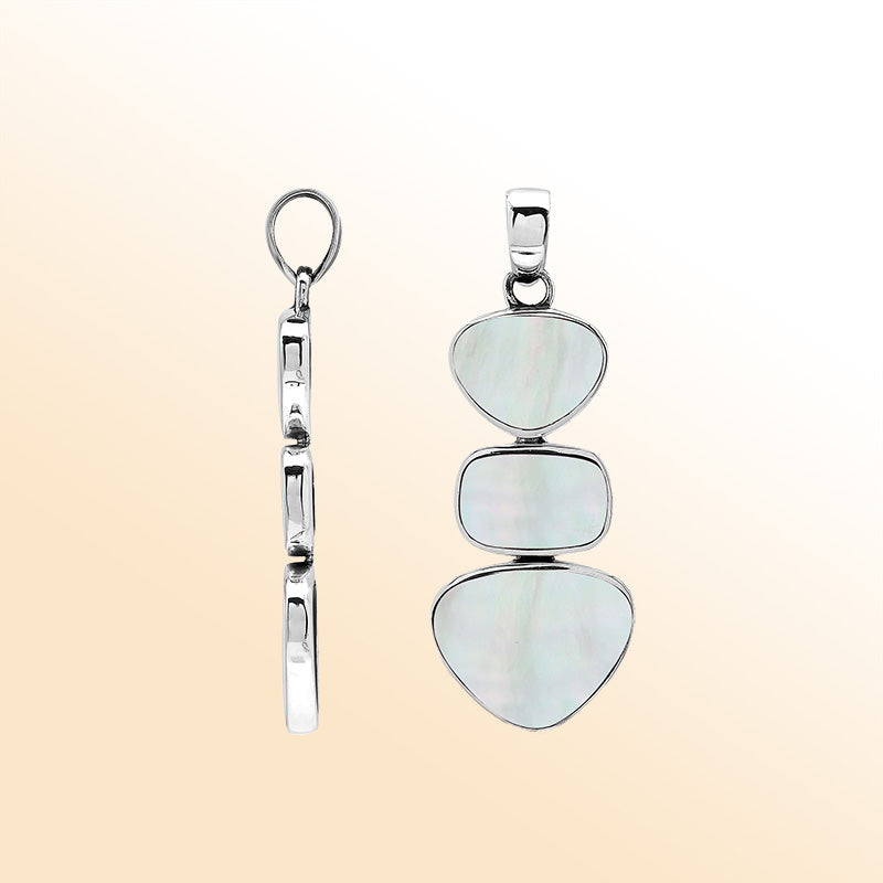 Handcrafted sterling silver triple-shape pendant with Mother Of Pearl stones, smooth polished surface, and refined Balinese artistry.
