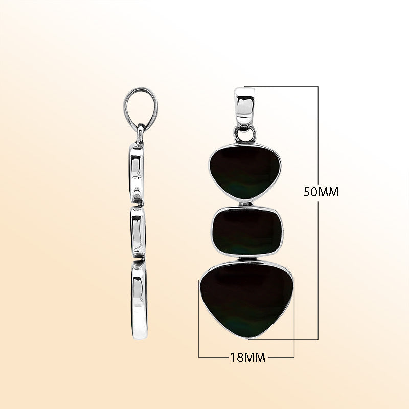 Handcrafted sterling silver triple-shape pendant with Black Shell stones, smooth polished surface, and refined Balinese artistry.