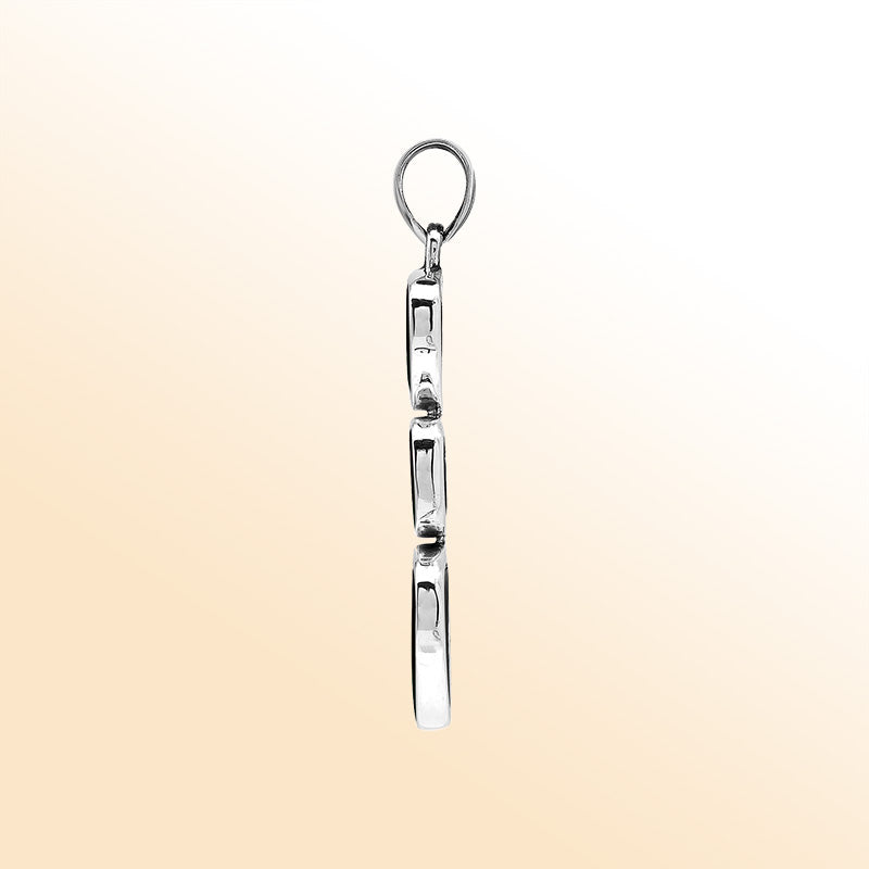 Handcrafted sterling silver triple-shape pendant with Black Shell stones, smooth polished surface, and refined Balinese artistry.