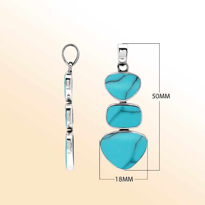 Handcrafted sterling silver pendant with three turquoise shell stones, smooth mirror-polished surface, and modern Balinese artistic detailing.