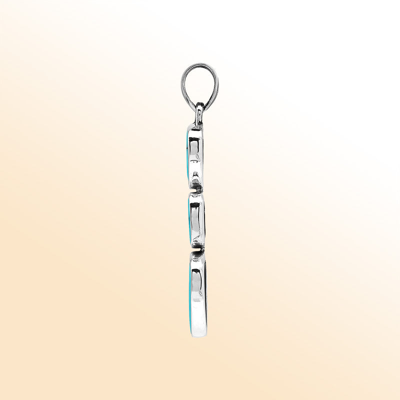 Handcrafted sterling silver pendant with three turquoise shell stones, smooth mirror-polished surface, and modern Balinese artistic detailing.