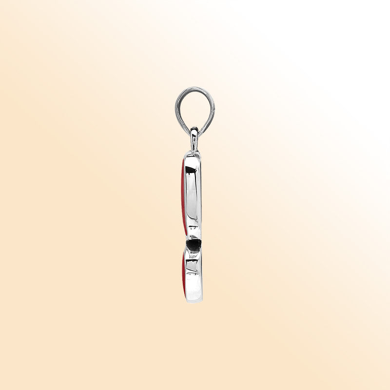 Handcrafted sterling silver double-shape pendant featuring Red Coral stones, polished smooth surface, and detailed Balinese artistry.
